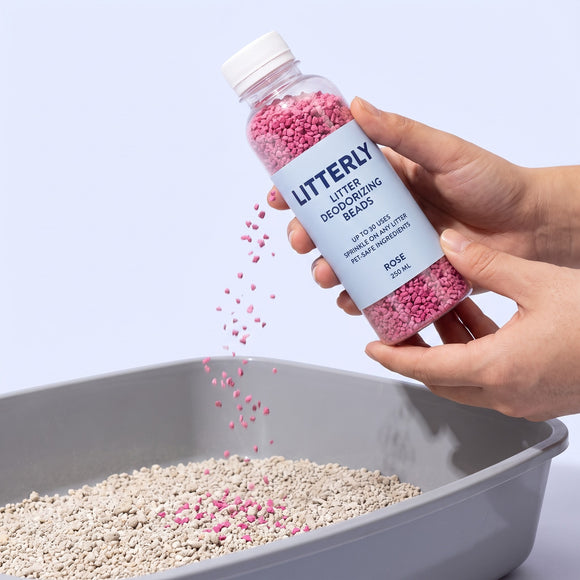 Litterly deodorizing beads sprinkled over litter